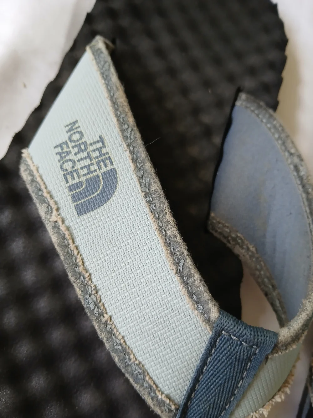 The North Face Blue and Black Flip Flop Sandals
